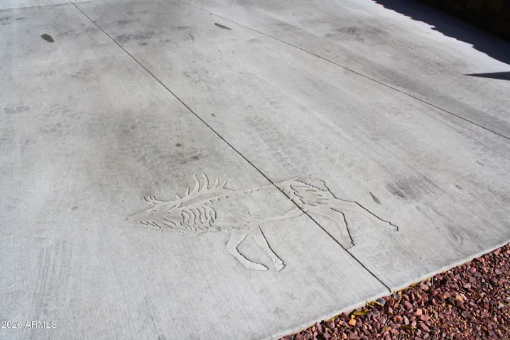 Custom Elk stamped in newly laid concrete all the way through.