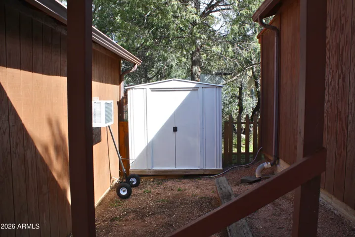 Shed between Garages
