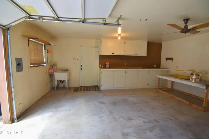 Inside Workshop + 1 Car Garage - With door to get to the 2 Car Garage