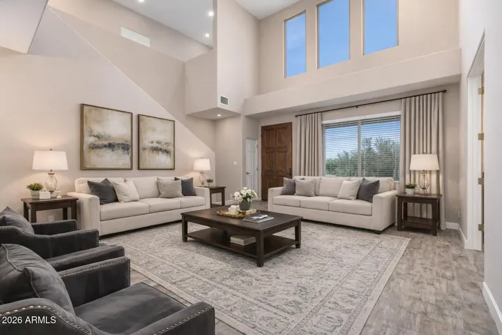 Grand entry space with soaring ceilings and flexible living potential.