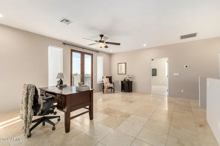 Versatile oversized loft ideal for a home office or additional living space.