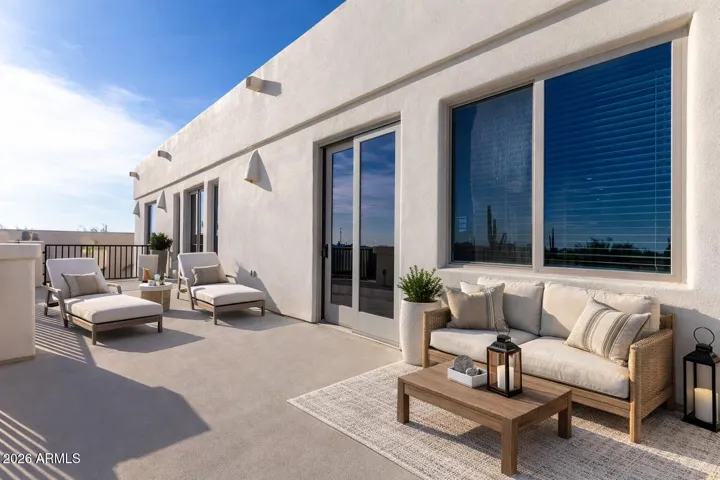 Spacious outdoor patio with comfortable seating, perfect for relaxing or entertaining.