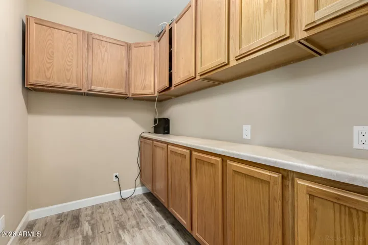 Extended cabinetry and countertop space for added storage and functionality.