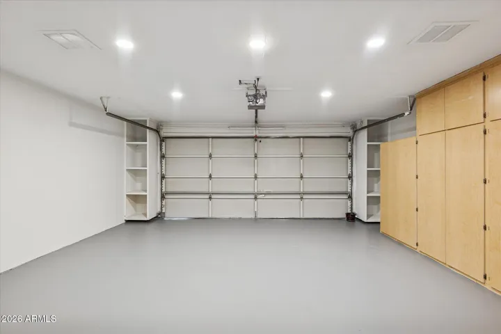 Private Attached Two-Car Garage with Built-In Storage
