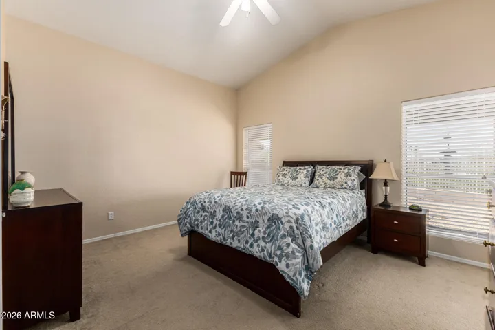 Spacious main bedroom including furniture