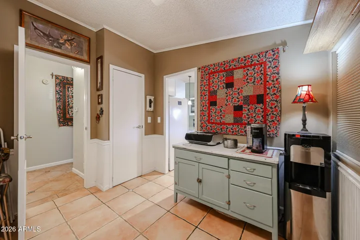 Laundry room has door to hallway and kitchen
