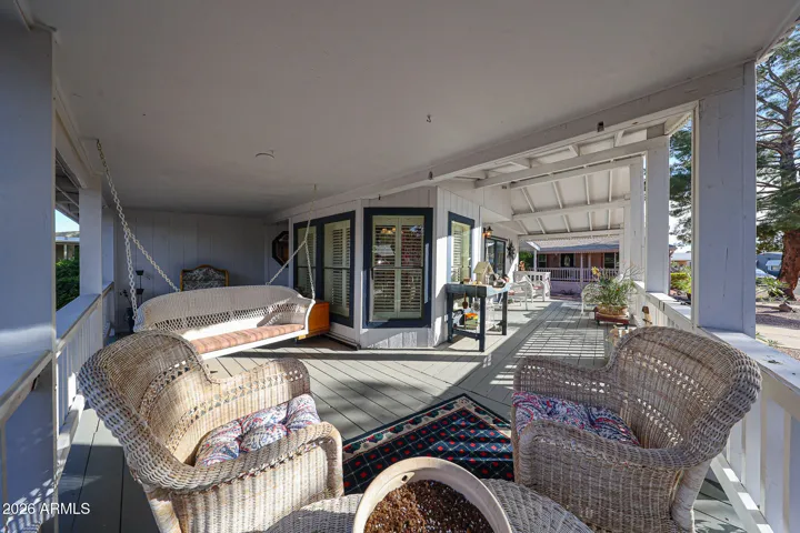 Wrap around deck. Swing stays with home