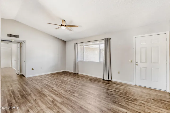 Front Entry into Living Room. New luxury vinyl flooring in 2021