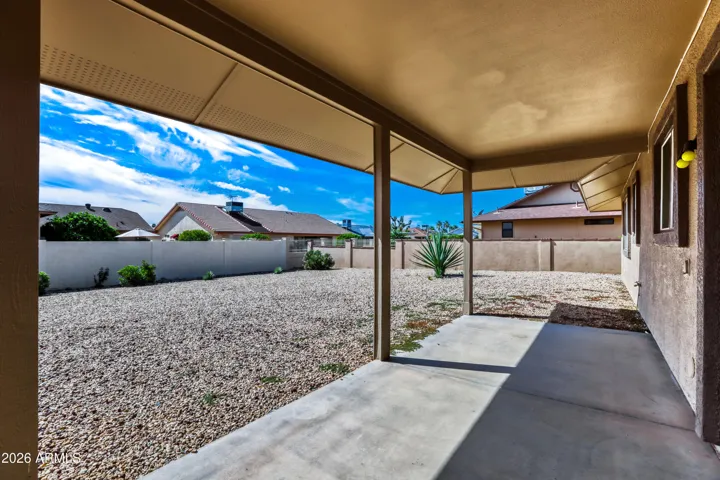 Covered back patio, large private lot.