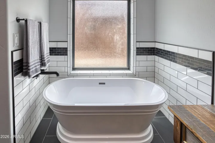 Stand-alone bathtub, farmhouse style.