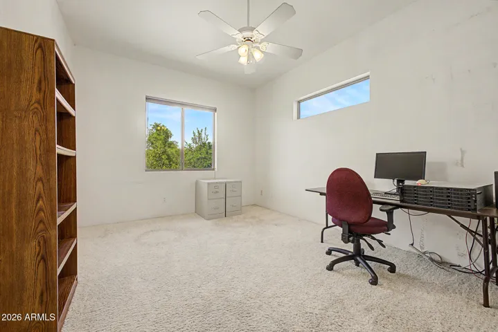 Office/den. Just needs door to be a 4th bedroom