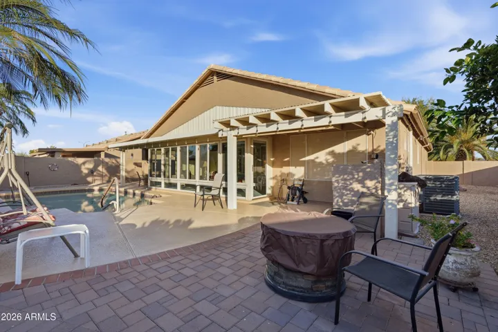 BBQ area, side yard and relation to kitch, dining room & Arizona room. room