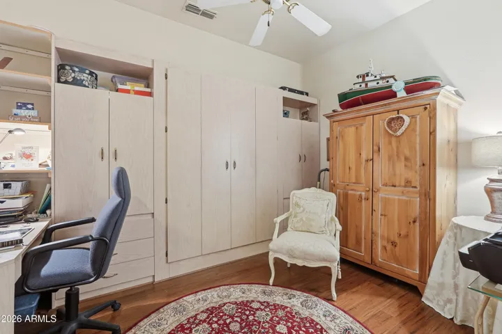 ......Bonus room & extra bedroom with built-in Murphy Bed and office closets.