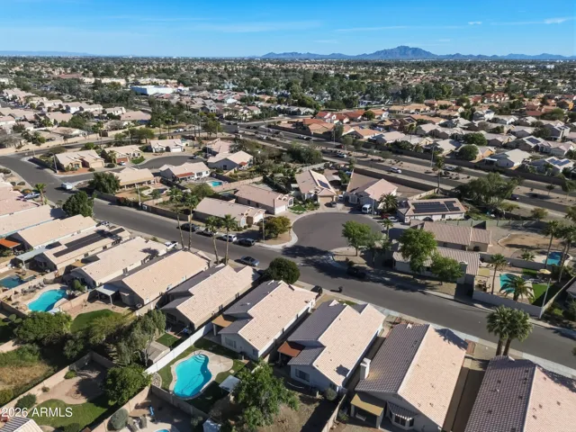 Location in neighborhood across from cul-de-sac with mountains in the distance.