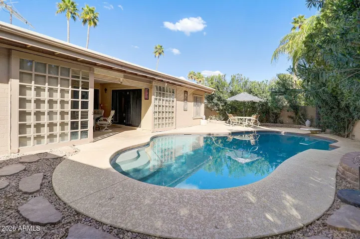 You'll love this south facing and very private back yard oasis. I can hear 3 Little Birds playing in the background....
