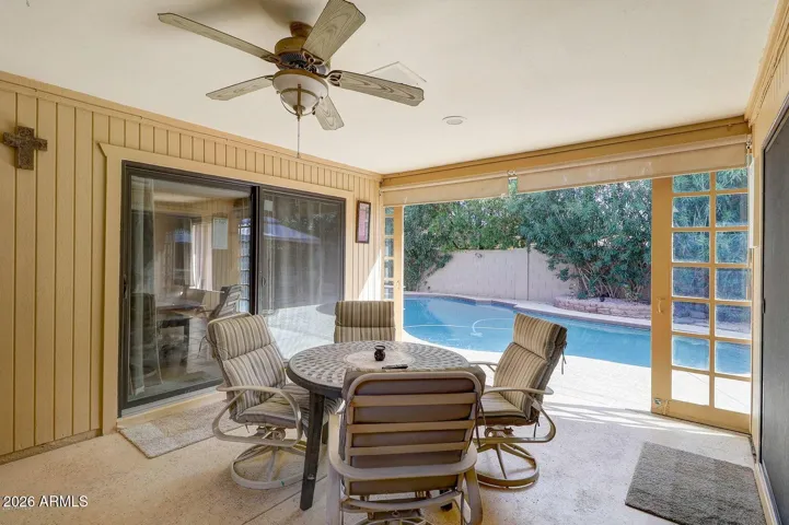 Enjoy shade while sitting and sipping poolside.