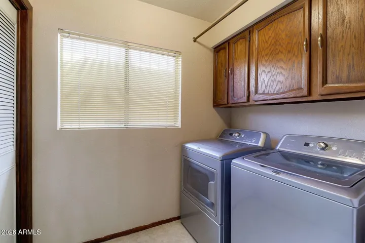 Indoor laundry conveniently located off the kitchen