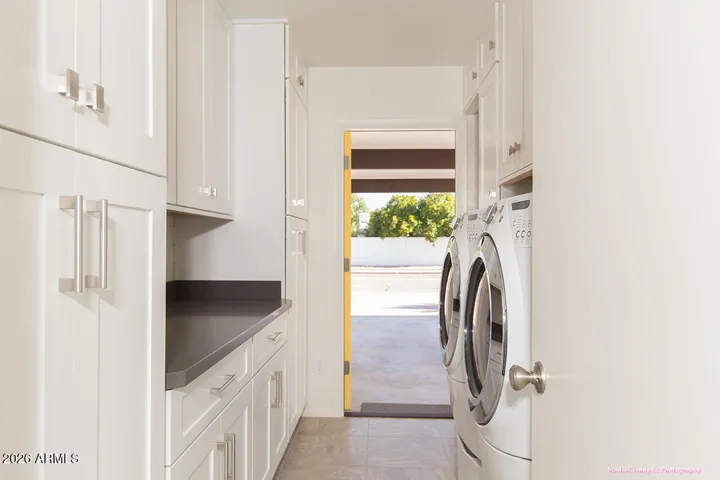 Laundry Room with added door to carport