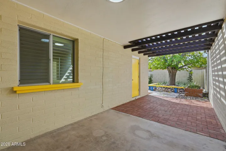 Exit from the living/bonus area to one of 2 covered patios