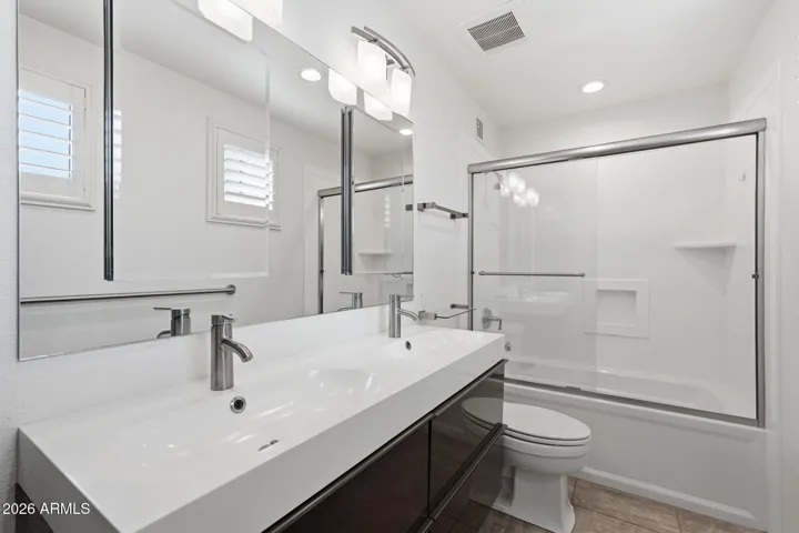 Remodeled and upgraded with dual vanities, and added shelves