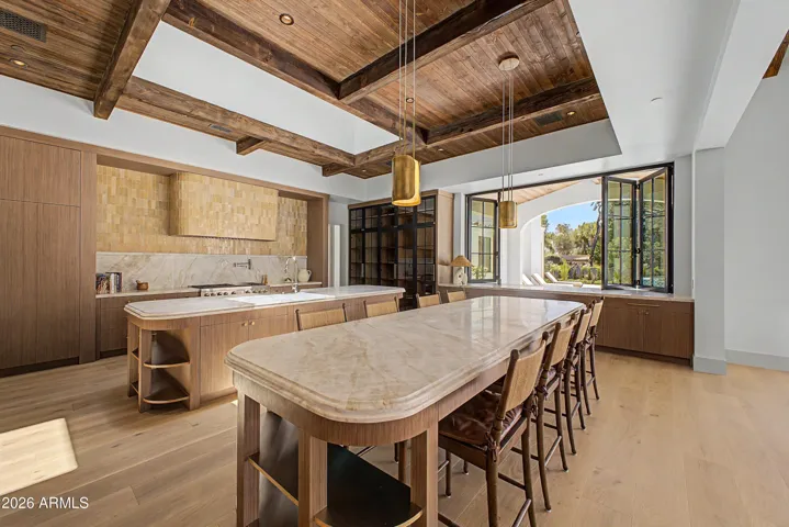 Pass Thru Window joins the Gourmet kitchen to the BBQ covered patio