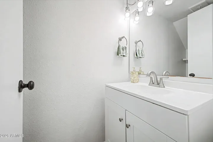 Convenient half bathroom downstairs.