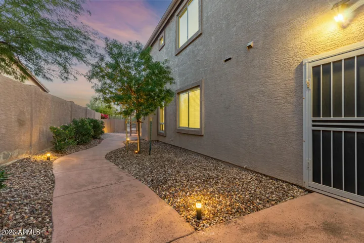 Side yard with garage access.
