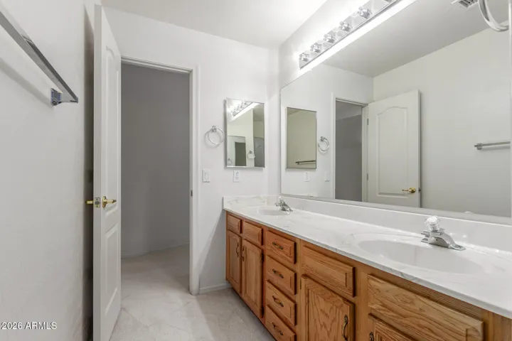 Dual-access full bathroom.