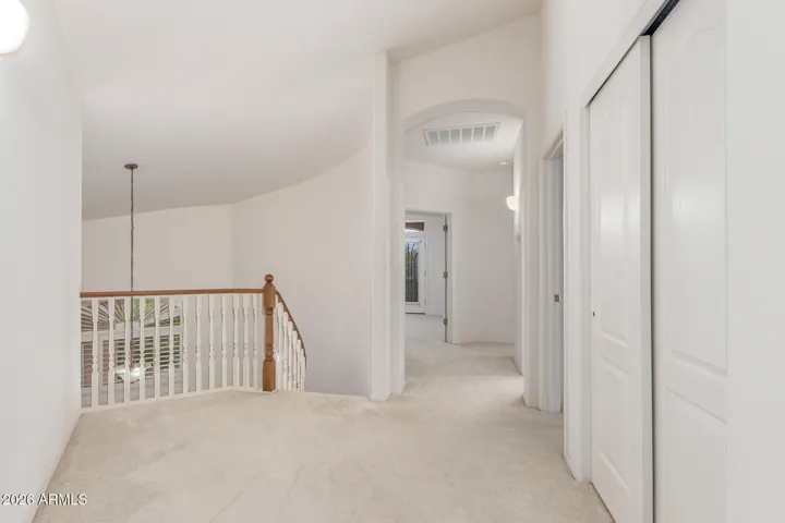 Upstairs foyer with access to all upstair bedrooms and dual-access full bathroom.