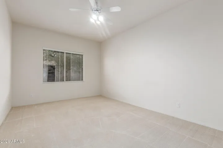Fifth downstairs bedroom with it's own full bathroom.