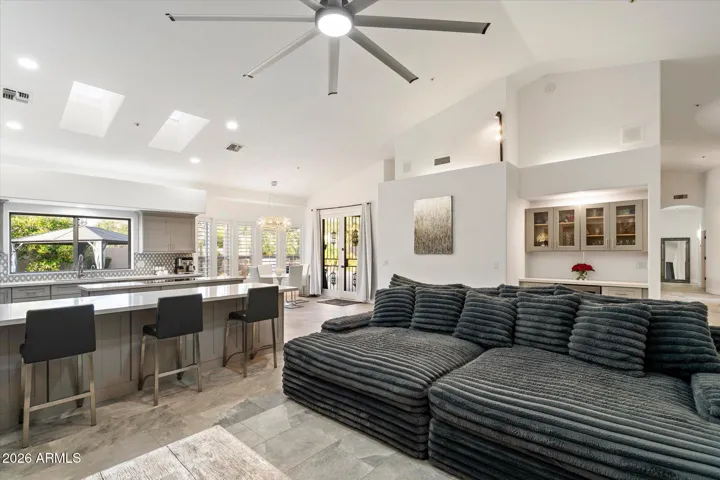 Living Room with vaulted ceilings and lots of natural light.