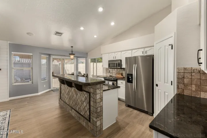 Kitchen with ample counter space and dining nook