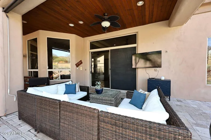 Ample Covered Outdoor Seating, Travertine Floors