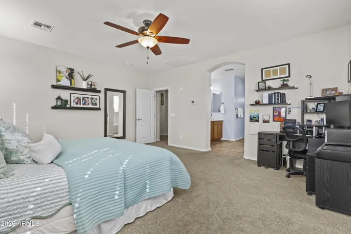 Master bedroom is large with a king bed, room for a home office