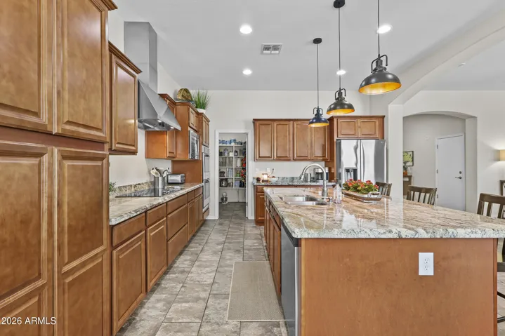 Along the kitchen island into the large panty