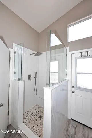 En suite bathroom offers direct access to the pool. No dripping through the house to shower off.