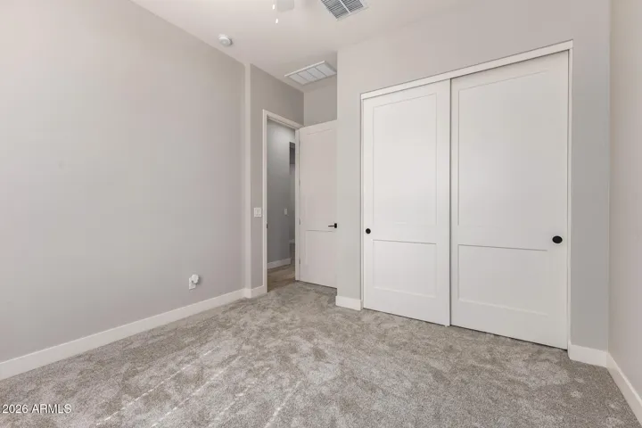 Split floor plan bedroom 1 with closet view