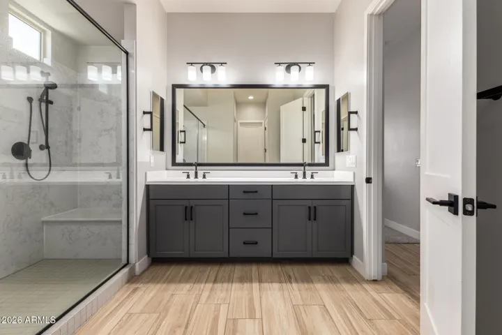 Master Bath with double sink, upgraded fixtures and large walk in shower