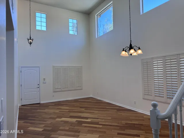 Enter into great room with soaring ceilings and clerestory windows for lots of light