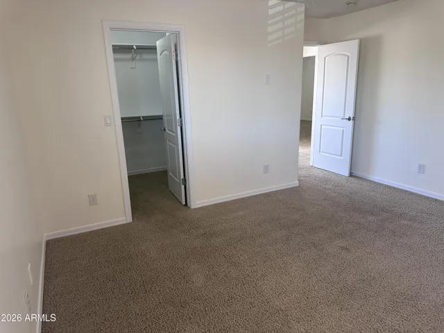 2nd bedroom looking towards closet and entry
