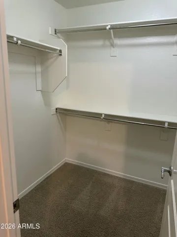 Close up view of walk-in closet in 2nd bdrm