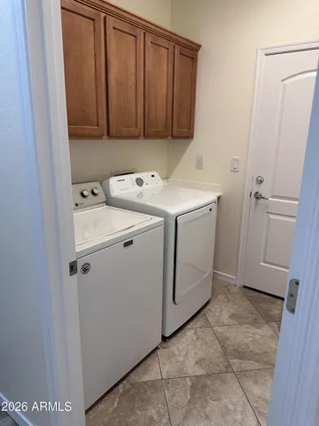 Laundry room with storage cabinets