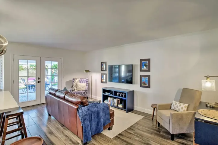 The patio is just a few steps away through the French doors.