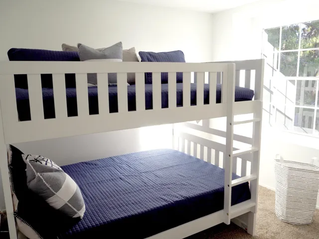These bunk beds have FULL over FULL size mattresses. There is also a walk-in closet.