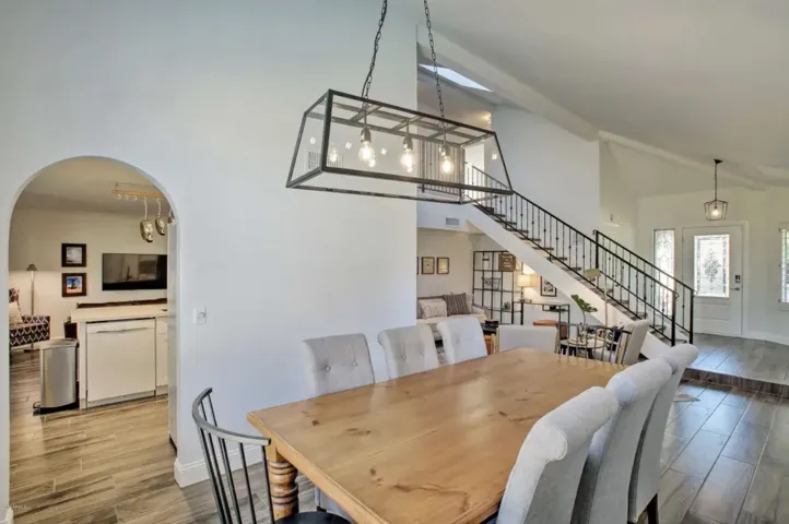 The spacious dining area connects the living room and kitchen.