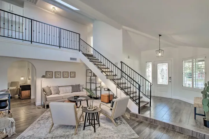 Enter into a soaring atrium illuminated by lots of windows and a skylight.