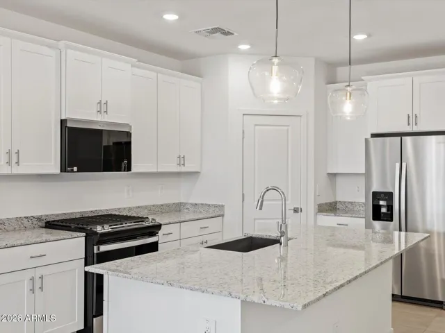 Photo is not of the actual home. Interior finishes and fixtures may vary.