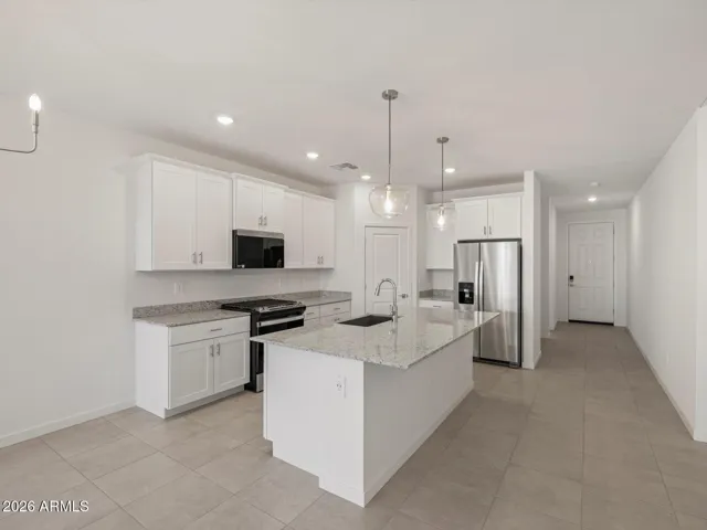 Photo is not of the actual home. Interior finishes and fixtures may vary.