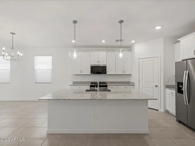 Photo is not of the actual home. Interior finishes and fixtures may vary.