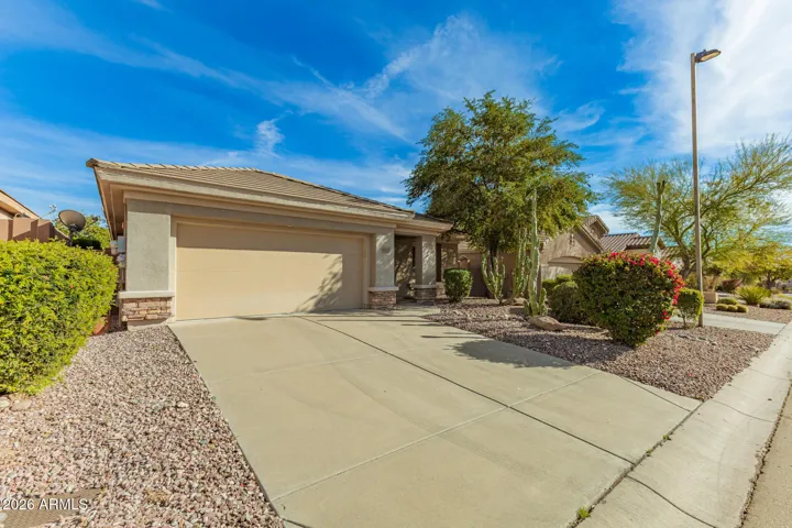 A spacious two car garage offers convenience, functionality, and ample room for storage.